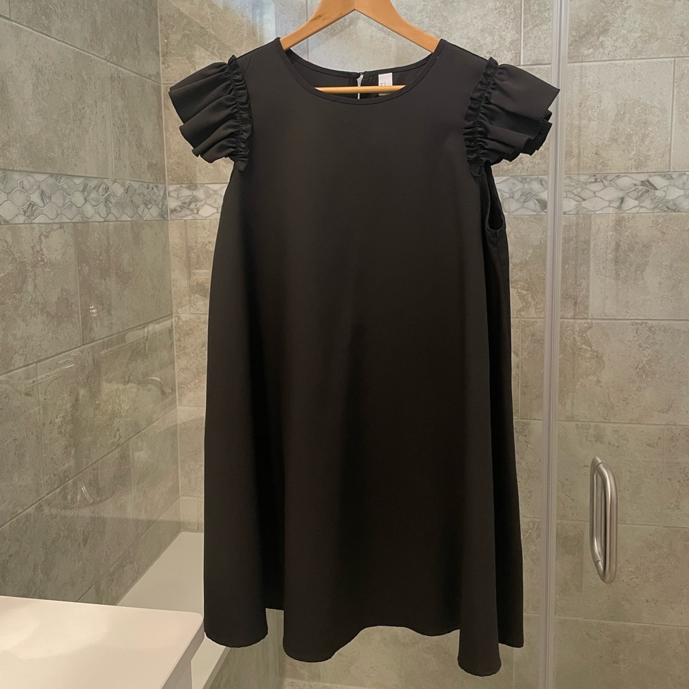 Black ruffled sleeve dress.